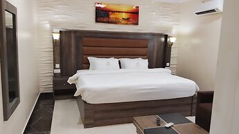 ADJ ROYALTY HOTELS & SUITES LTD