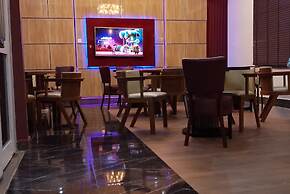 ADJ ROYALTY HOTELS & SUITES LTD