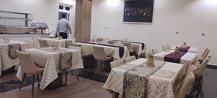 ADJ ROYALTY HOTELS & SUITES LTD