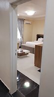 ADJ ROYALTY HOTELS & SUITES LTD