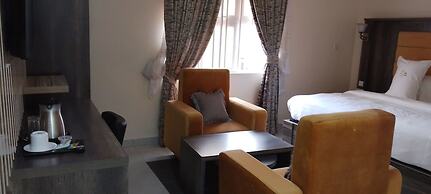 ADJ ROYALTY HOTELS & SUITES LTD
