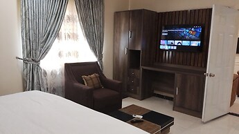 ADJ ROYALTY HOTELS & SUITES LTD