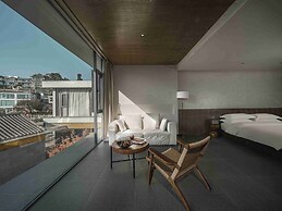 Mangshu Taotangzhiqiu Seaview Hotel