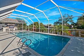 Luxury Heated Pool Home on Saltwater Canal w Tiki
