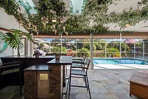 Luxury Heated Pool Home on Saltwater Canal w Tiki