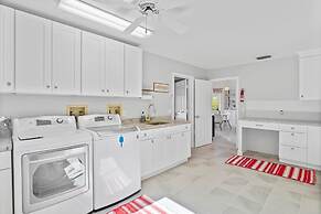 Luxury Heated Pool Home on Saltwater Canal w Tiki