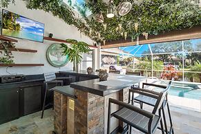 Luxury Heated Pool Home on Saltwater Canal w Tiki
