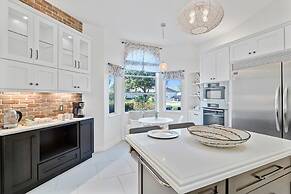 Luxury Heated Pool Home on Saltwater Canal w Tiki