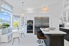 Luxury Heated Pool Home on Saltwater Canal w Tiki