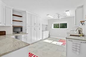 Luxury Heated Pool Home on Saltwater Canal w Tiki