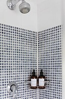 Charming Beach Getaway - Spacious 4BR Sunny Garden