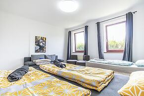 Cozy 3BR Apt with Garden Sleeps 10