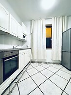 Cozy 3BR Apt with Garden Sleeps 10