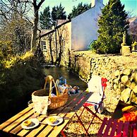 Riverside Cottage at Logwood Mill