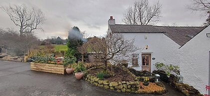 Riverside Cottage at Logwood Mill