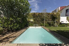 Contemporary Restelo Pool Haven by Cadenzalux