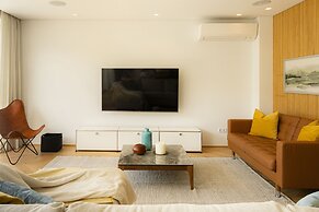 Contemporary Restelo Pool Haven by Cadenzalux