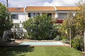 Contemporary Restelo Pool Haven by Cadenzalux