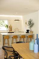 Contemporary Restelo Pool Haven by Cadenzalux