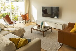 Contemporary Restelo Pool Haven by Cadenzalux