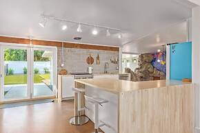 Northview Mid-century Escape Pool Firepit Bocce