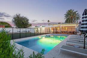 Northview Mid-century Escape Pool Firepit Bocce