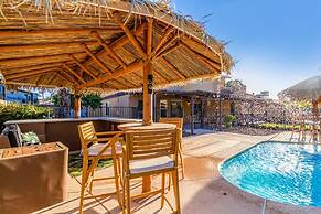 Tiki Paradise w Htd Pool Putt Grn Tiki Bar