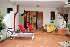 Excellently Equipped row House With Fenced Garden for 8 in Lignano Pin