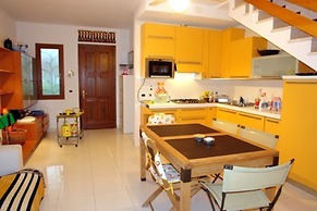 Excellently Equipped row House With Fenced Garden for 8 in Lignano Pin