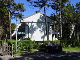 Excellently Equipped row House With Fenced Garden for 8 in Lignano Pin