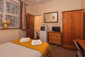 Ricky Road Guest House - Budget