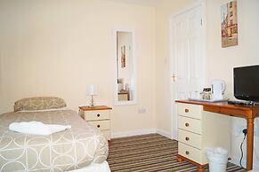 Ricky Road Guest House - Budget