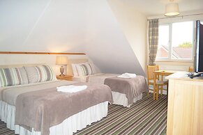 Ricky Road Guest House - Premium