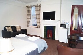 Ricky Road Guest House - Premium