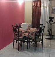 Charming Piarco Home With Garden View