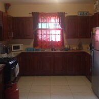 Charming Piarco Home With Garden View