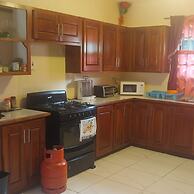 Charming Piarco Home With Garden View