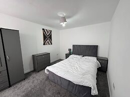 Housesleeps9-patio-parking-familyok