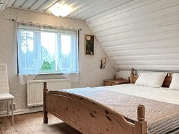 Serene Lakehouse With Rowing Boat