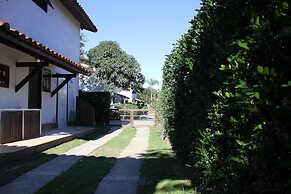 Bz10 Casa 4 suítes em condomínio clube