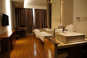 Baolong Homelike Hotel Changxing Branch