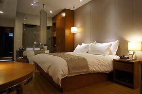 Baolong Homelike Hotel Changxing Branch