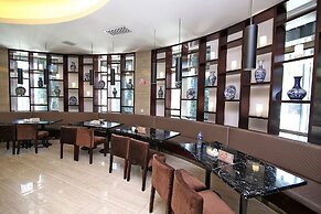 Baolong Homelike Hotel Changxing Branch