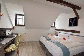 Landhotel Der Distelhof mit Scheunencafé