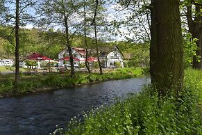 Landhotel Der Distelhof mit Scheunencafé