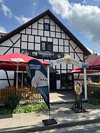 Landhotel Der Distelhof mit Scheunencafé