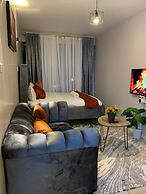 Lux Suites Coral Bells Studio Apartments