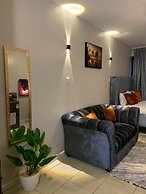 Lux Suites Coral Bells Studio Apartments
