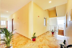 Super Hotel O Radha Residency