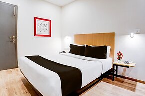 Cozy Stays Near Halasuru Metro Station